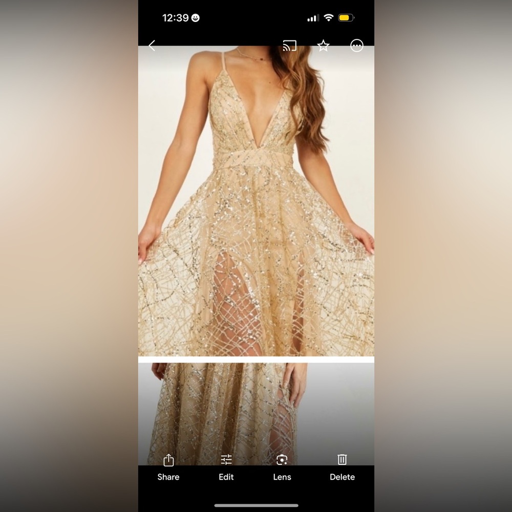 Reselling never worn but ordered online and was too long.